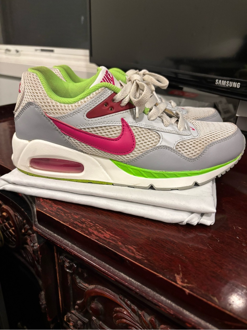 Nike Women's Air Max 1 Sneakers in Gray with Pink Swoosh and Lime Green Accents